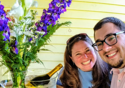 On the day of the big proposal, Josh had one more little surprise up his sleeve. He had arranged for flowers and champaign on our private porch at our Bed and Breakfast to celebrate our engagement and 3rd anniversary.